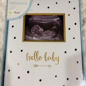 Pearhead Baby Book with Gold and Black Dots